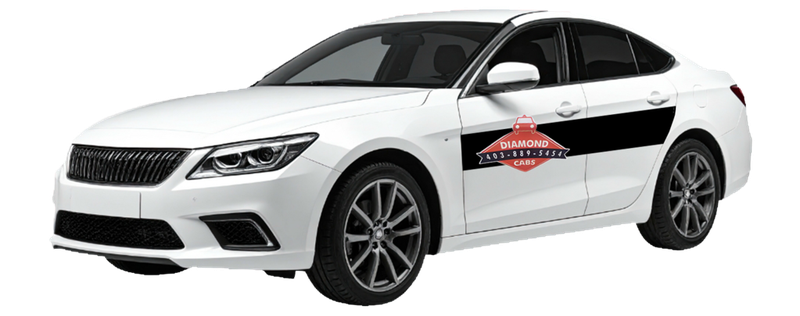 Airdrie Diamond Cabs sedan in white with red diamond livery